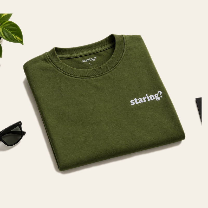 That One Studio, folded tee flat lay