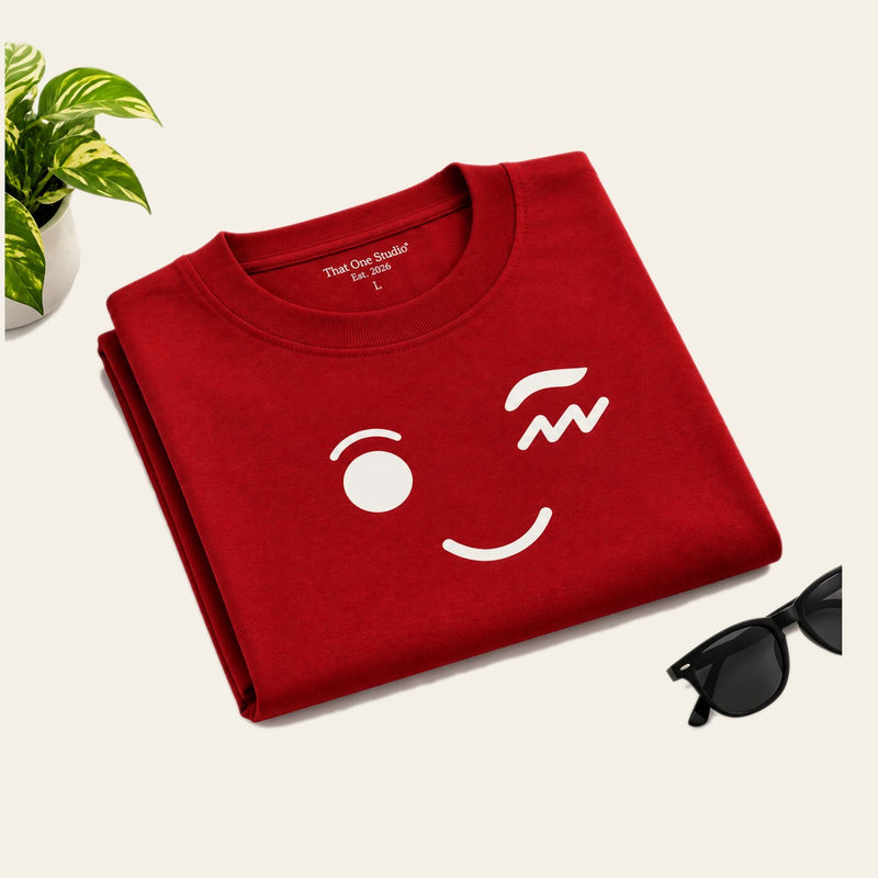 That One Studio, folded tee flat lay