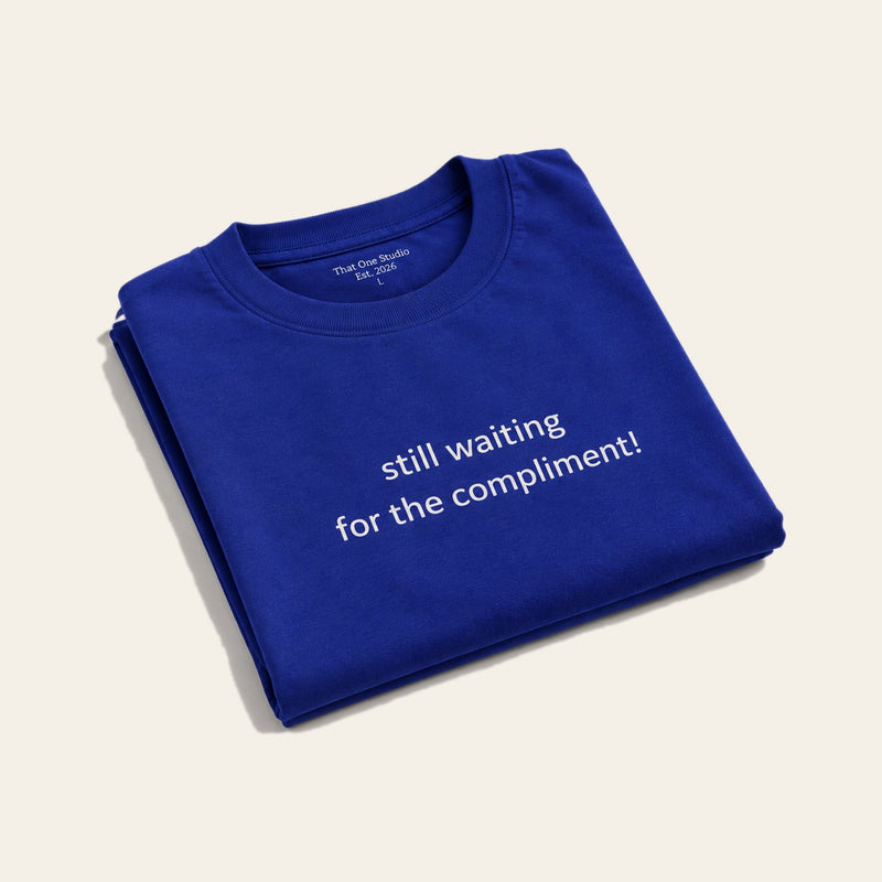 That One Studio, folded tee flat lay